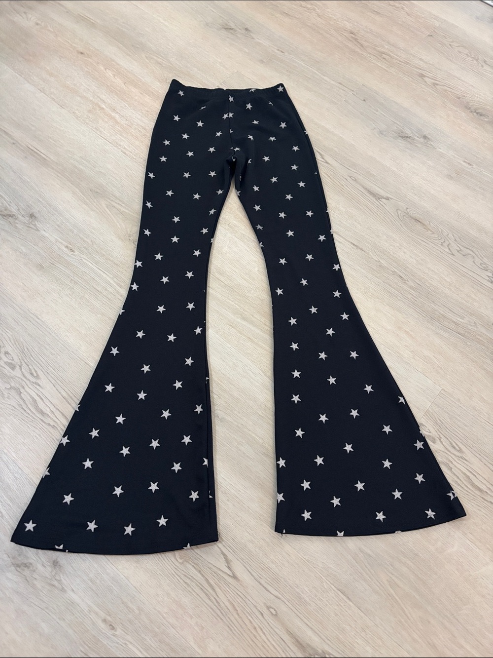 Nasty Gal black with white star polyester flare leggings rave festival Halloween